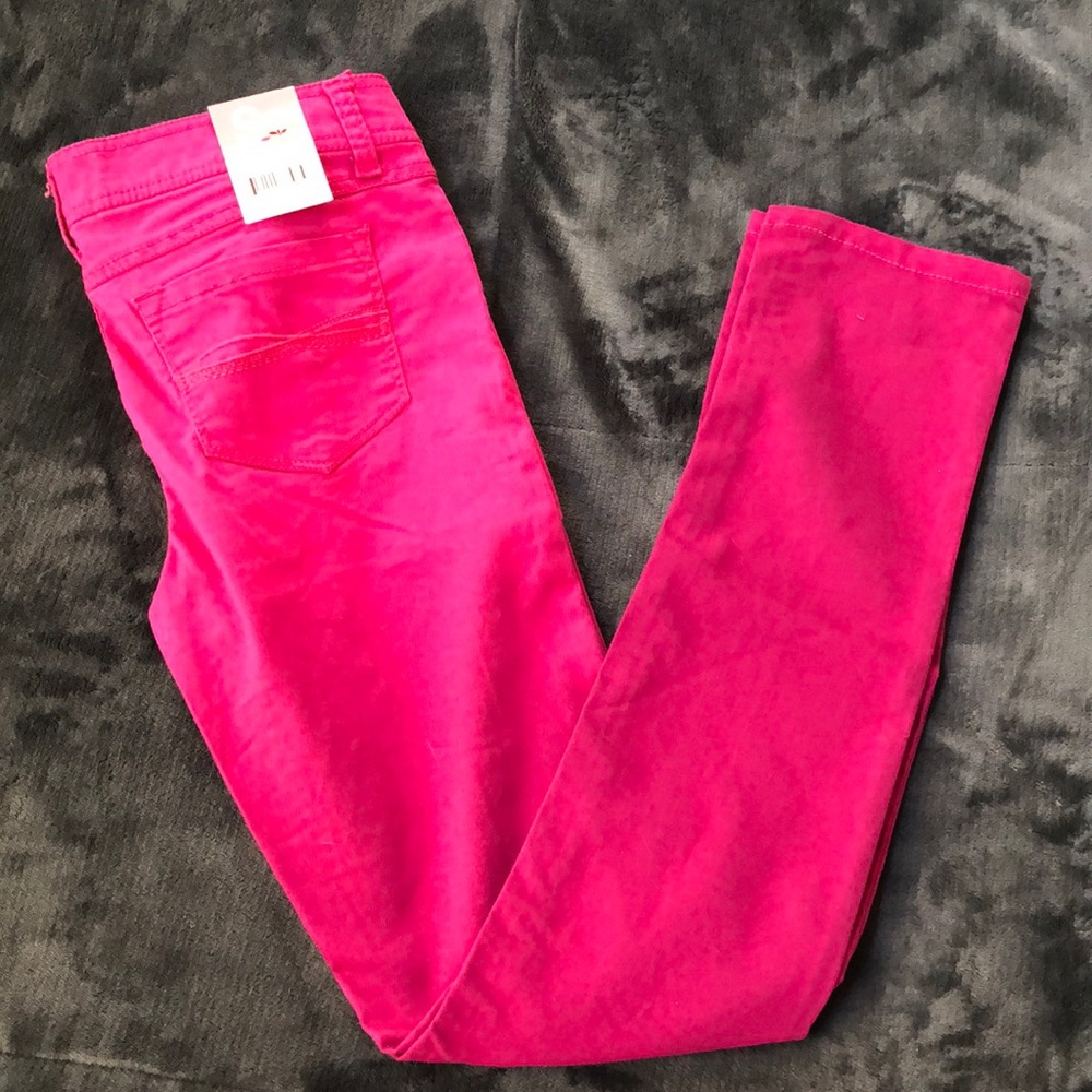 Pink faded skinny pants